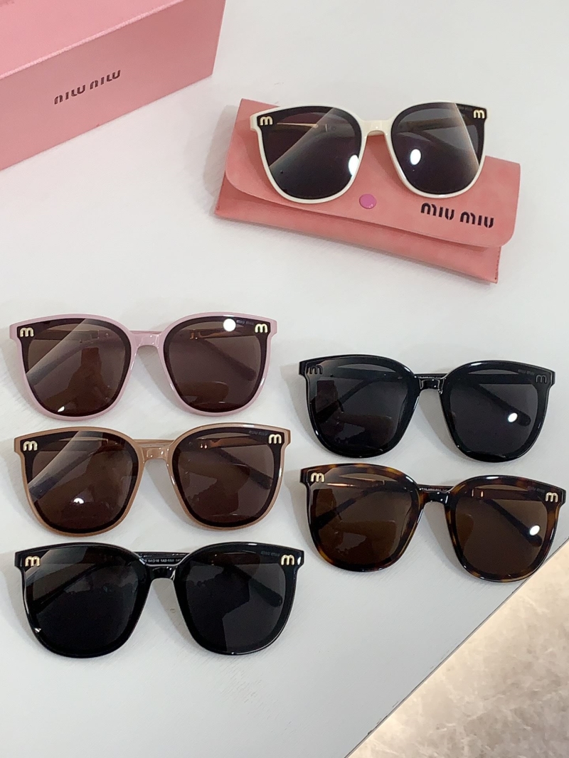 Miu miu Sunglasses